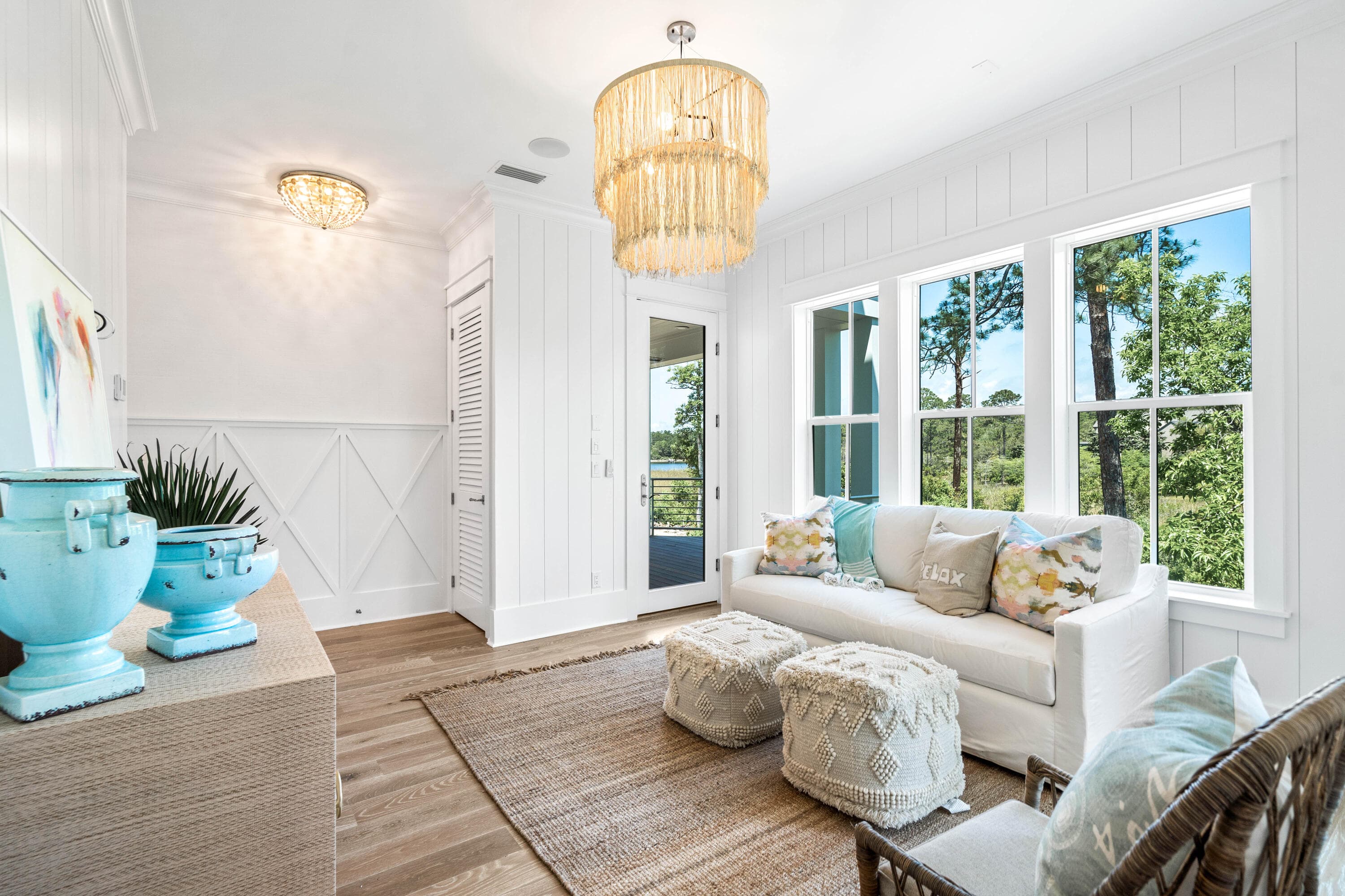 Living room. Layered pendants, fan close by.